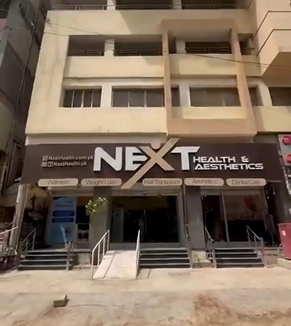 Next Health & Aesthetics clinic entrance in Bahadurabad, Karachi